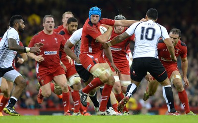 151114 - Wales v Fiji - Dove Men Series -Justin Tipuric of Wales gets past Josh Matavesi of Fiji