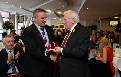 151114 - Wales v Fiji - Dove Men Series -Leighton Jones receives a WRU president cap on behalf of Stephen Paul Jones from WRU President Dennis Gethin