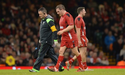 151114 - Wales v Fiji - Dove Men Series -Gethin Jenkins of Wales leaves the field with team doctor Geoff Davies