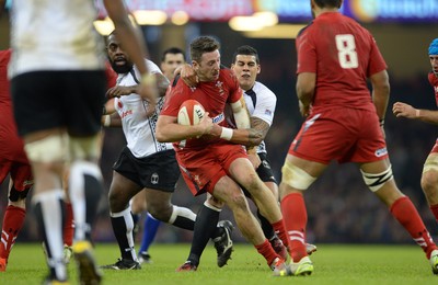 151114 - Wales v Fiji - Dove Men Series -Alex Cuthbert of Wales is tackled by Josh Matavesi of Fiji