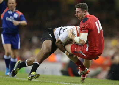 151114 -  Wales v Fiji, Dove Men Series 2014, Cardiff - Alex Cuthbert of Wales is tackled by Asaeli Tikoirotuma of Fiji 