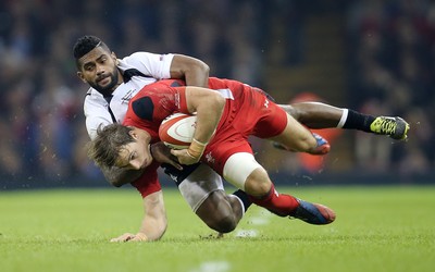 151114 -  Wales v Fiji, Dove Men Series 2014, Cardiff - Liam Williams of Wales is tackled by Nikola Matawalu of Fiji  