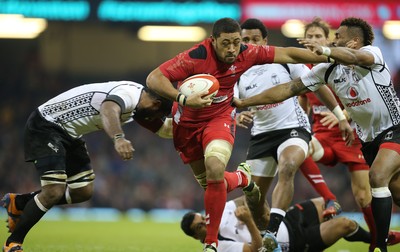 151114 -  Wales v Fiji, Dove Men Series 2014, Cardiff - Taulupe Faletau of Wales charges through the Fijian defence