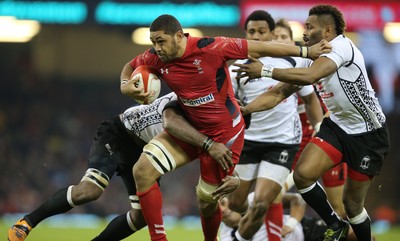 151114 -  Wales v Fiji, Dove Men Series 2014, Cardiff - Taulupe Faletau of Wales charges through the Fijian defence