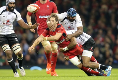 151114 -  Wales v Fiji, Dove Men Series 2014, Cardiff - Liam Williams of Wales is tackled by Tevita Cavubati and Waisea Nayacalevu of Fiji 