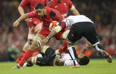 151114 -  Wales v Fiji, Dove Men Series 2014, Cardiff - Taulupe Faletau of Wales is tackled by Masi Matadigo of Fiji 