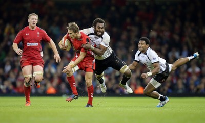 151114 -  Wales v Fiji, Dove Men Series 2014, Cardiff - Liam Williams of Wales  is tackled by Leone Nakarawa of Fiji 