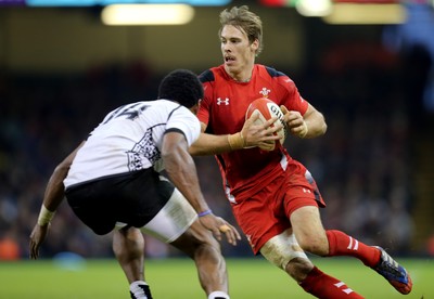 151114 -  Wales v Fiji, Dove Men Series 2014, Cardiff - Liam Williams of Wales takes on Waisea Nayacalevu of Fiji 