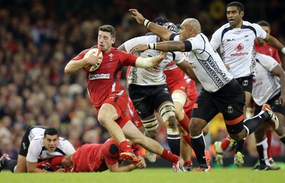 151114 -  Wales v Fiji, Dove Men Series 2014, Cardiff - Alex Cuthbert of Wales tries to break away from Nemani Nadalo of Fiji 