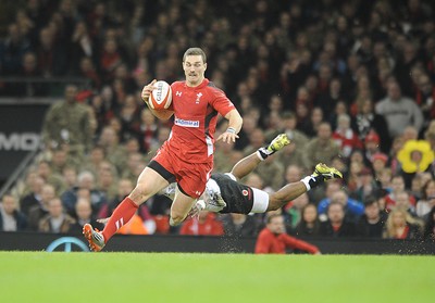 151114 - Wales v Fiji - Dove Men Series -Wales George North beats tackle by Nikola Matawalu of Fiji(c) Huw Evans Agency