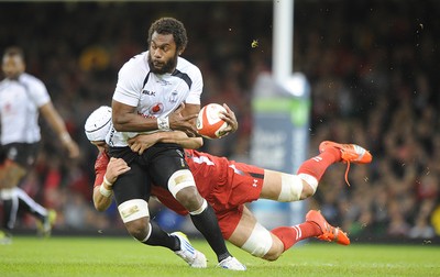 151114 - Wales v Fiji - Dove Men Series -Leone Nakarawa of Fiji is tackled by Luke Charteris(c) Huw Evans Agency