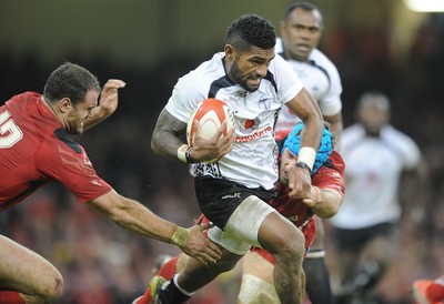 151114 - Wales v Fiji - Dove Men Series -Nikola Matawalu of Fiji is tackled by Jamie Roberts and Justin Tipuric(c) Huw Evans Agency