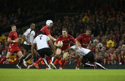 151114 - Wales v Fiji - Dove Men Series -George North of Wales is tackled by Josh Matavesi of Fiji  (c) Huw Evans Picture Agency