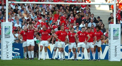29.09.07 - Wales v Fiji - Rugby World Cup 2007 - Wales players look dejected after a Fiji try 