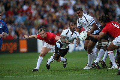 29.09.07 Wales v Fiji... Fiji's Mosese Rauluni gets ball away from Dwayne Peel 