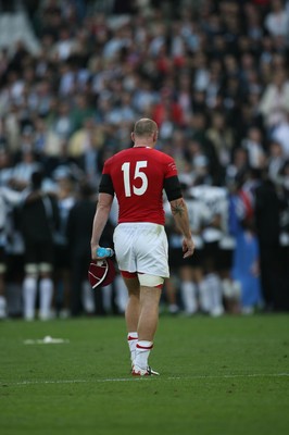 29.09.07 Wales v Fiji... Wales' captain Gareth Thomas leaves the field dejected carrying the 100th celebratory cap. 