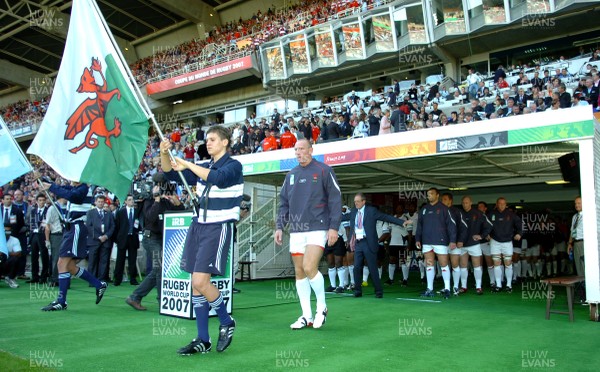 29.09.07 - Wales v Fiji - Rugby World Cup 2007 - Wales Captain, Gareth Thomas leads the teams out to earn his 100th cap for Wales 