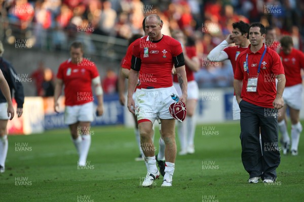 29.09.07 Wales v Fiji... Wales' captain Gareth Thomas leaves the field dejected carrying the 100th celebratory cap. 