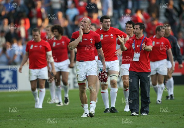29.09.07 Wales v Fiji... Wales' captain Gareth Thomas leaves the field dejected carrying the 100th celebratory cap. 