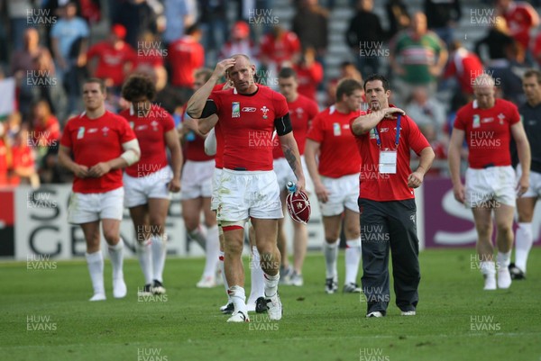29.09.07 Wales v Fiji... Wales' captain Gareth Thomas leaves the field dejected carrying the 100th celebratory cap. 