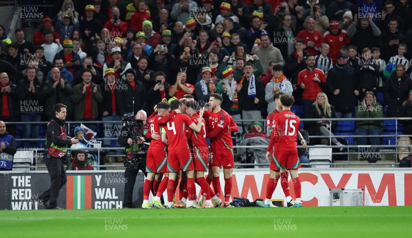 210324 - Wales v Finland, Euro 2024 qualifying play-off semi-final - Wales celebrate after scoring the opening goal
