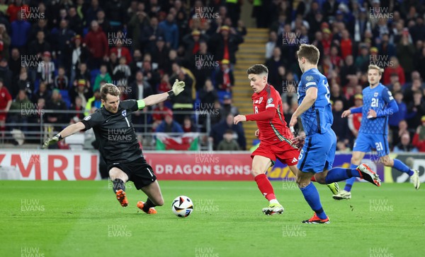 210324 - Wales v Finland, Euro 2024 qualifying play-off semi-final - Harry Wilson of Wales is denied by Finland goalkeeper Lukas Hradecky