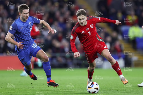 210324 - Wales v Finland, Euro 2024 qualifying play-off semi-final - David Brooks of Wales gets past Miro Tenho of Finland
