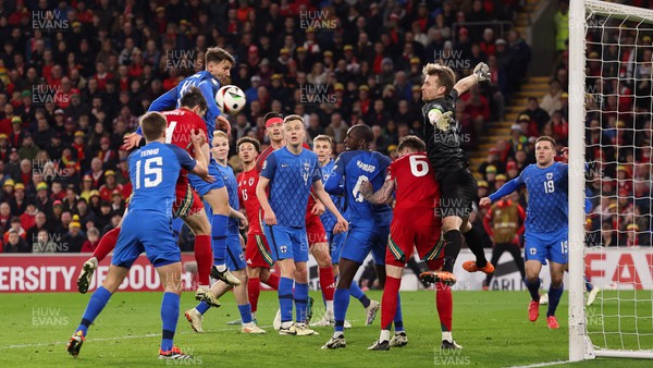 210324 - Wales v Finland, Euro 2024 qualifying play-off semi-final - Finland goalkeeper Lukas Hradecky fails to keep the ball out as Ben Davies of Wales looks to have scored, only for the goal to be ruled out after a VAR check