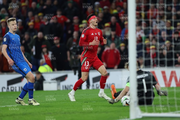 210324 - Wales v Finland, Euro 2024 qualifying play-off semi-final - Kieffer Moore of Wales reacts after missing a chance to score