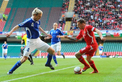 28.03.09 - Wales v Finland, FIFA World Cup 2010 Qualifying Group 4 -  Wales' Craig Bellemy tries to get past Finland's Sami Hyypia 