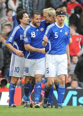 28.03.09 - Wales v Finland, FIFA World Cup 2010 Qualifying Group 4 -  Finland's Shefki Quqi is congratulated after scoring his sides second goal L-R: Jari Litmanen, Shefki Quqi, Sami Hyypia, Hannu Tihinen 