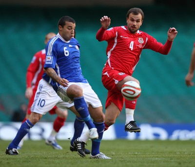 28.03.09 - Wales v Finland, FIFA World Cup 2010 Qualifying Group 4 -  Wales' Carl Fletcher challenges Finland's Aleksei Eremenko  
