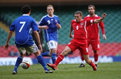 28.03.09 - Wales v Finland, FIFA World Cup 2010 Qualifying Group 4 -  Wales' Craig Bellamy challenges Finland's Roman Eremenko  