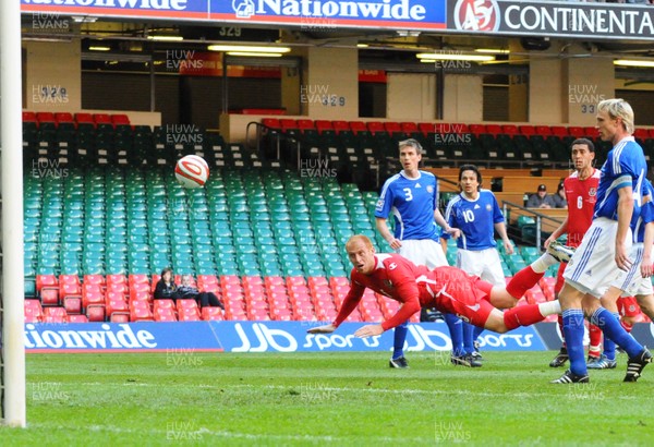 28.03.09 - Wales v Finland, FIFA World Cup 2010 Qualifying Group 4 -  Wales' James Collins heads towards goal only to see his effort saved 