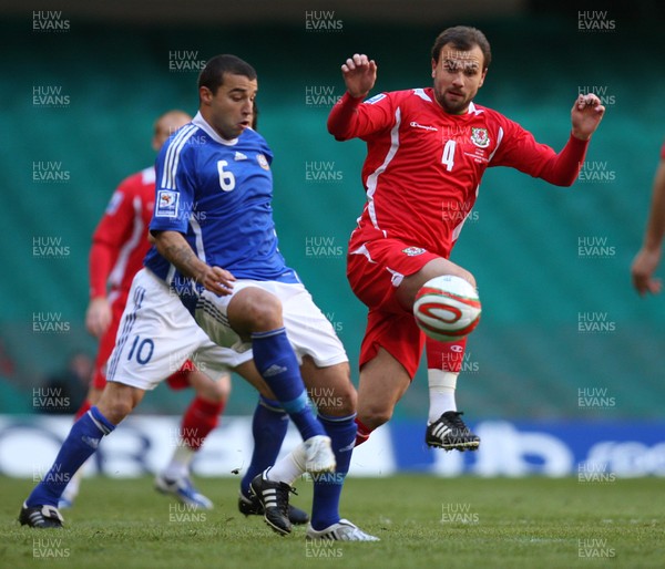 28.03.09 - Wales v Finland, FIFA World Cup 2010 Qualifying Group 4 -  Wales' Carl Fletcher challenges Finland's Aleksei Eremenko  