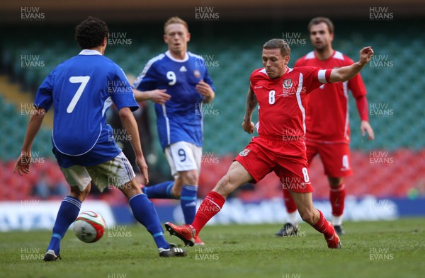 28.03.09 - Wales v Finland, FIFA World Cup 2010 Qualifying Group 4 -  Wales' Craig Bellamy challenges Finland's Roman Eremenko  