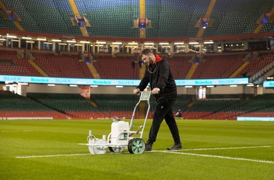 100324 - Wales v France - Guinness 6 Nations Championship - Groundsman prepares the ground before the game