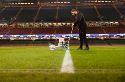 100324 - Wales v France - Guinness 6 Nations Championship - Groundsman prepares the ground before the game