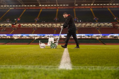 100324 - Wales v France - Guinness 6 Nations Championship - Groundsman prepares the ground before the game