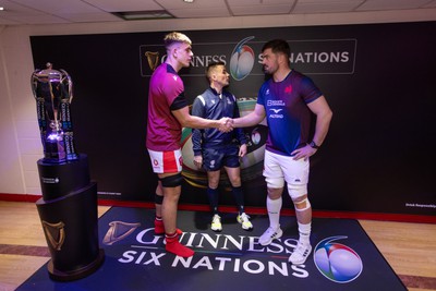 100324 - Wales v France - Guinness 6 Nations Championship - Dafydd Jenkins of Wales and Gregory Alldritt of France with Referee Luke Pearce during the coin toss