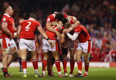 100324 - Wales v France - Guinness 6 Nations Championship - Rio Dyer of Wales celebrates scoring a try with team mates