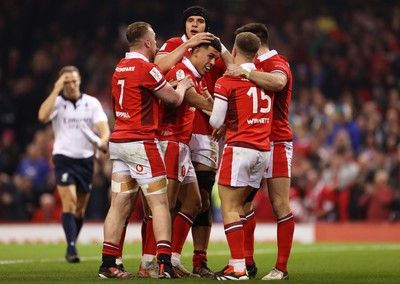 100324 - Wales v France - Guinness 6 Nations Championship - Rio Dyer of Wales celebrates scoring a try with team mates