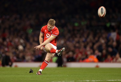 100324 - Wales v France - Guinness 6 Nations Championship - Sam Costelow of Wales kicks the conversion