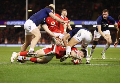 100324 - Wales v France - Guinness 6 Nations Championship - Joe Roberts of Wales scores a try