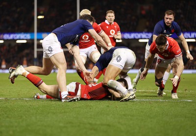 100324 - Wales v France - Guinness 6 Nations Championship - Joe Roberts of Wales scores a try