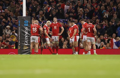 100324 - Wales v France - Guinness 6 Nations Championship - Dejected Wales under the posts