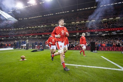 100324 - Wales v France - Guinness 6 Nations Championship - Alex Mann of Wales runs onto the pitch