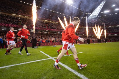 100324 - Wales v France - Guinness 6 Nations Championship - Ioan Lloyd of Wales runs onto the pitch