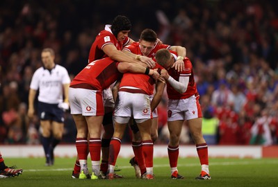 100324 - Wales v France - Guinness 6 Nations Championship - Rio Dyer of Wales celebrates scoring a try