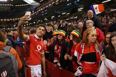 100324 - Wales v France - Guinness 6 Nations Championship - Rio Dyer of Wales with fans